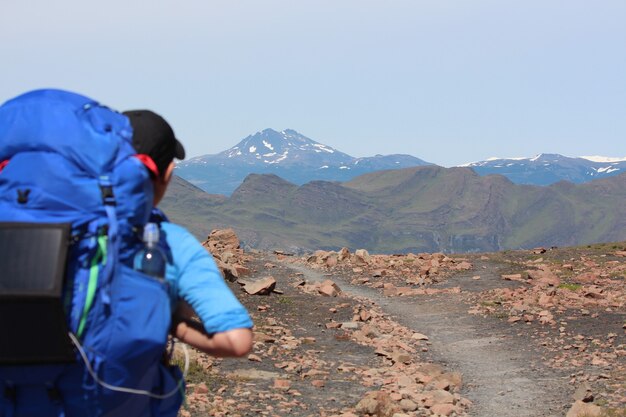 Man with a backpack walking in nature