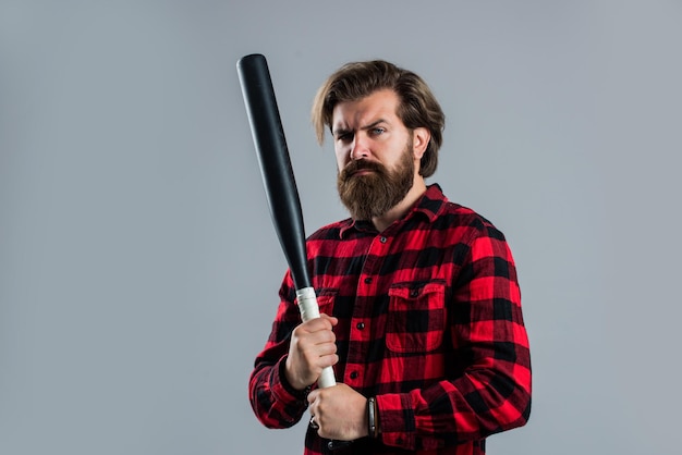 Photo man with baseball bat i am a criminal aggression and anger brutal male hipster ready to fight mature man in checkered shirt success at any cost outdoor sport activity