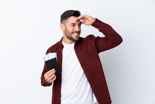 Man with beard going to travel over isolated wall