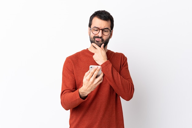 Man with beard over isolated wall