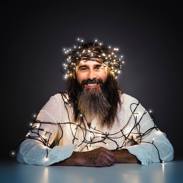 Man with beard and long hair smiling