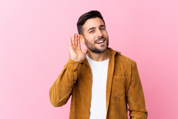 Man with beard over wall