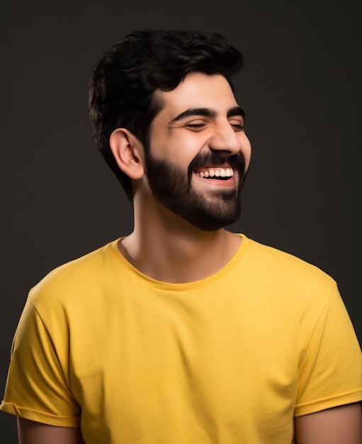 A man with a beard wearing a yellow shirt