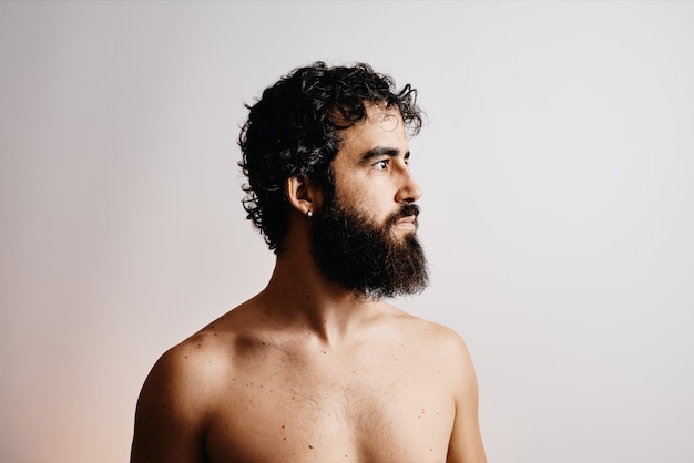 man with a beard without a T-shirt