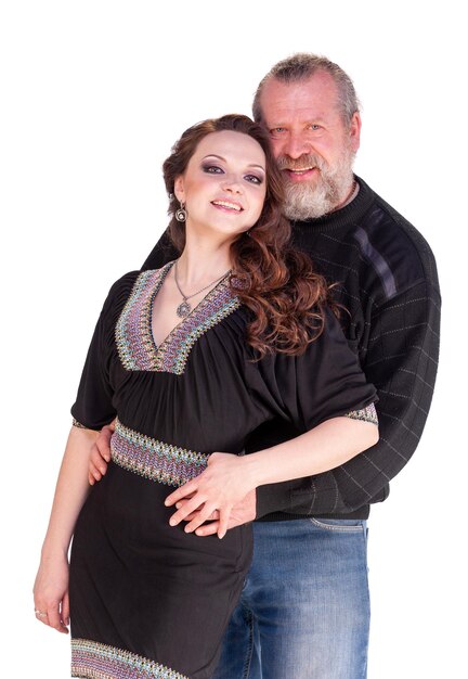 A man with a beard and a young woman on a neutral white background.