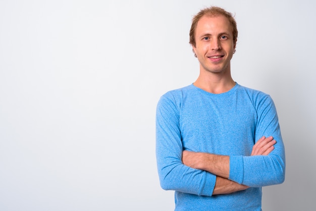 man with blond hair against white space