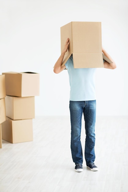 Man with a box at home