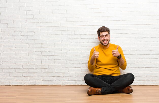 man with cheerful, carefree, rebellious attitude, joking and sticking tongue out, having fun