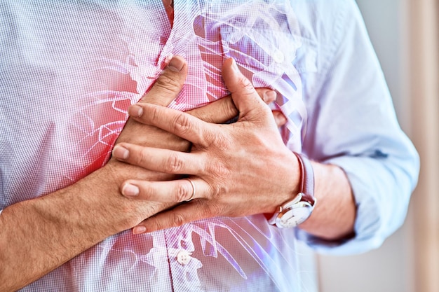 Man with chest pain injury or medical accident for heart attack inflammation or sprain Healthcare medicare and male with sickness problem or illness with a health risk or cardiovascular disease