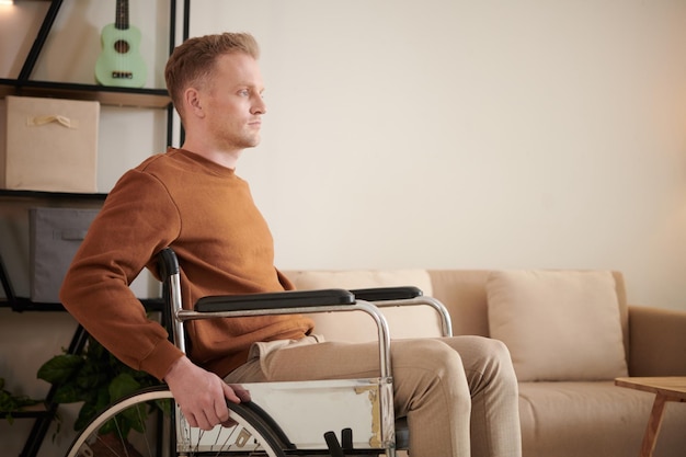 Man with Disability Moving around House