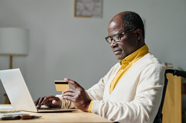 Man with disability paying online