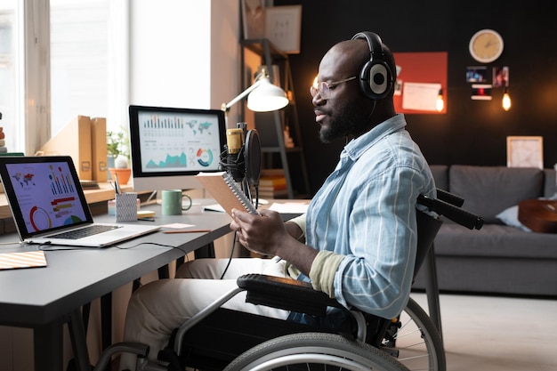 Man with disability studying online