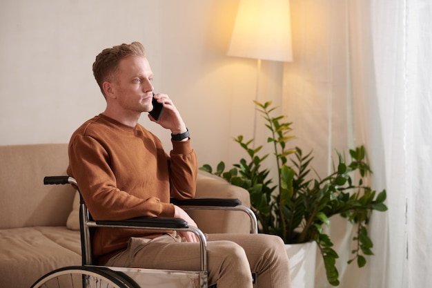 Man with Disability Talking on Phone