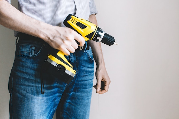 Man with a drill in his hand