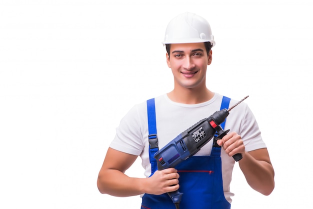 Man with drill isolated on the white