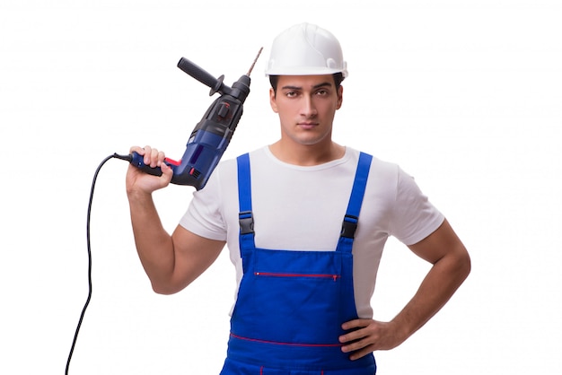 Man with drill isolated on the white 