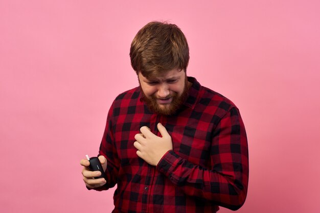 Photo man with emotions on his face and a beard