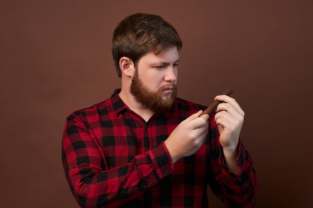 Man with emotions on his face and a beard