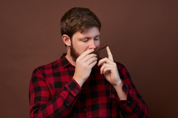 Man with emotions on his face and a beard