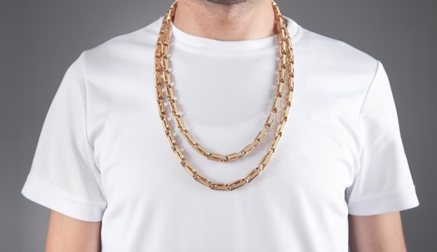 Man with a expensive necklace. Fashion accessories and jewelry