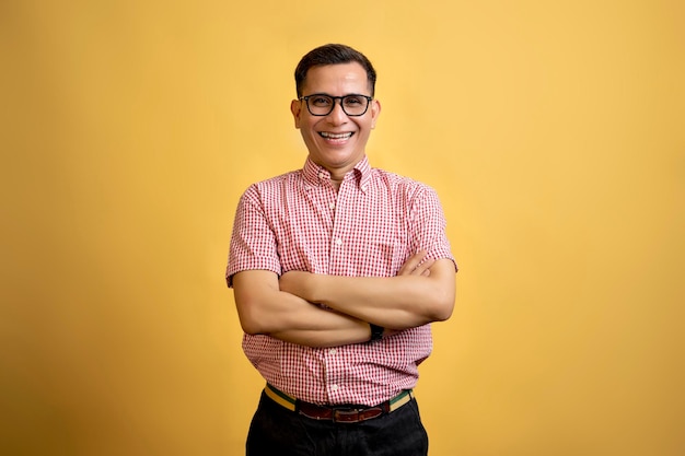 Man with eyeglasses and a shirt standing