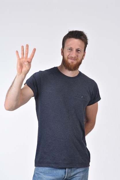 Man with finger in the shape of number four