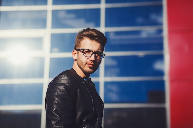 Man with glasses and a black leather