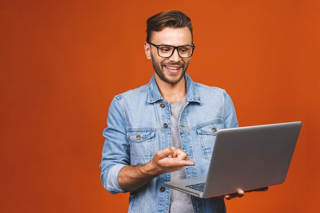 Man with glasses posing in studio