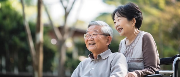 a man with glasses and a woman in a park