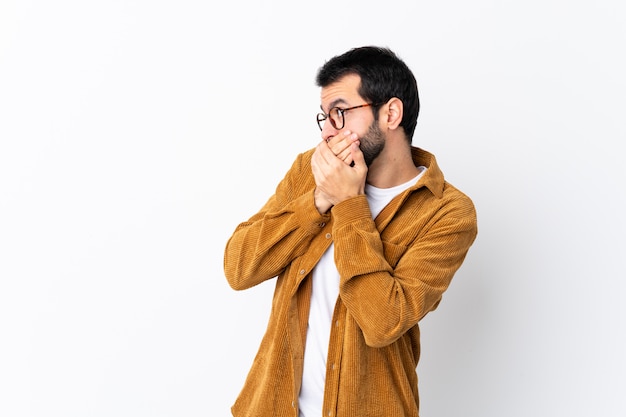 Man with glasses and yellow shirt