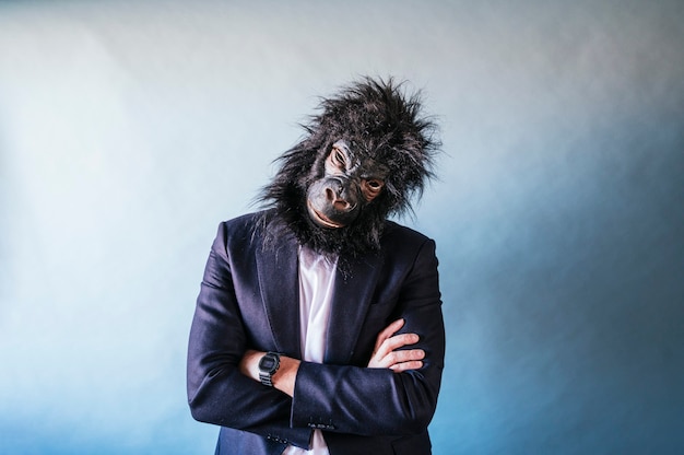 Man with gorilla mask posing