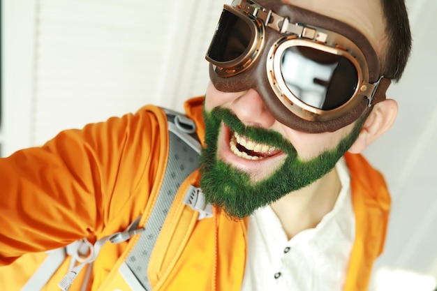 A man with a green beard StPatrick 's Day Irish fan color beard