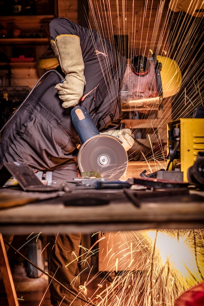 Man with grinder in action