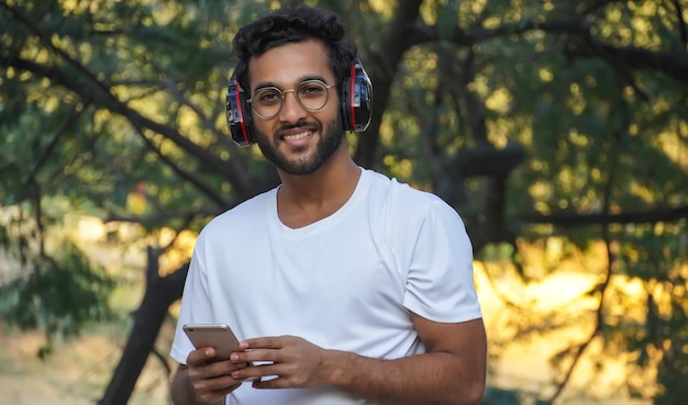 A man with headphone feeling the song