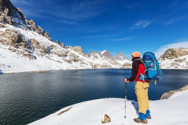 Man with hiking equipment walking in Sierra Nevada mountains, California, USA