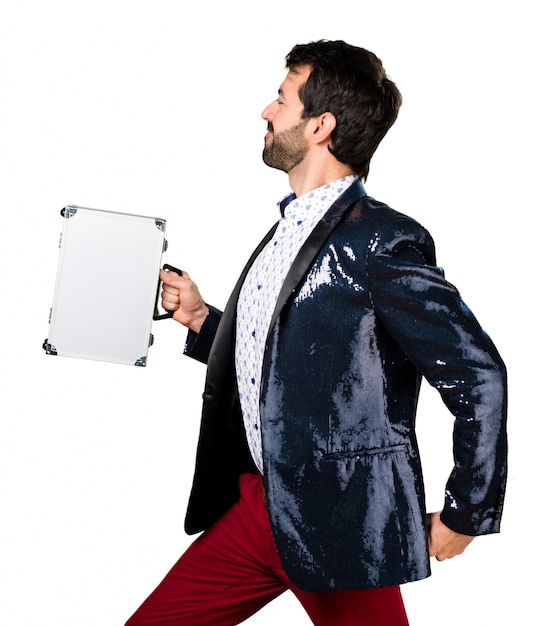 Man with jacket holding a briefcase