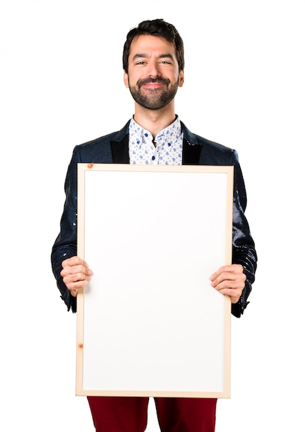 Man with jacket holding an empty placard