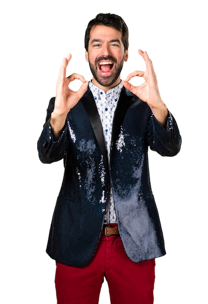 Man with jacket making OK sign