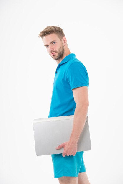 Man with laptop in blue sport clothes. Sportsman with computer for internet game. Sport bets and gambling online. New technology for modern life. Fashion for sport and fitness activity.