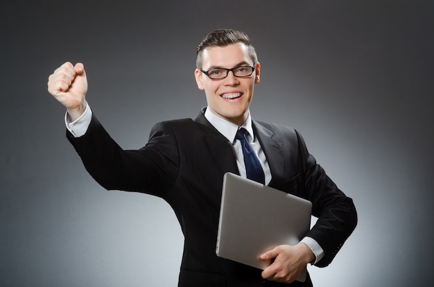 Man with laptop in business concept