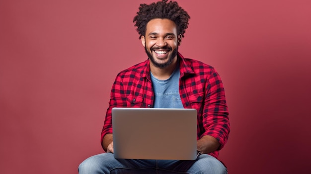 A man with a laptop on his lap