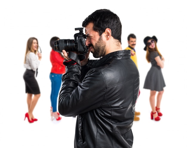 Man with leather jacket photographing