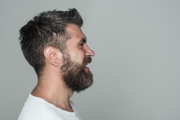 Man with long beard on happy face