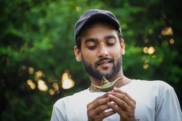 Man with magic lamp image