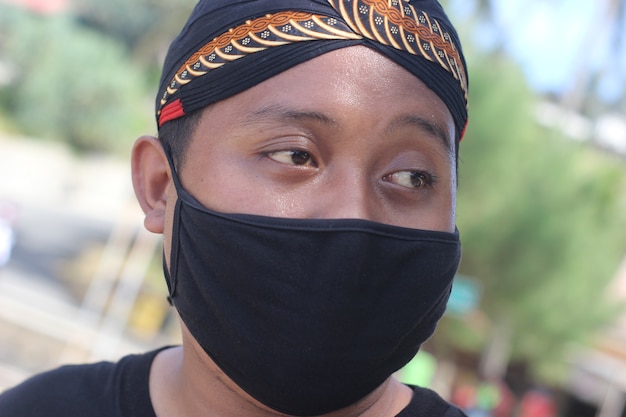 man with mask photo