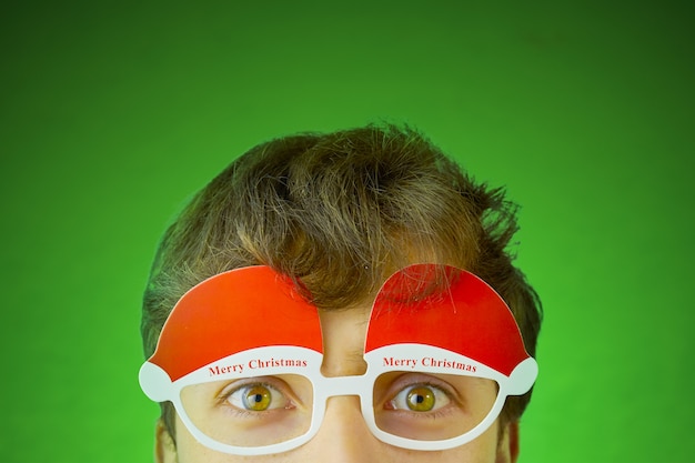 Man with Merry Christmas glasses  