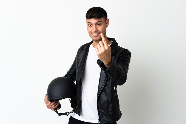 Man with a motorcycle helmet doing coming gesture