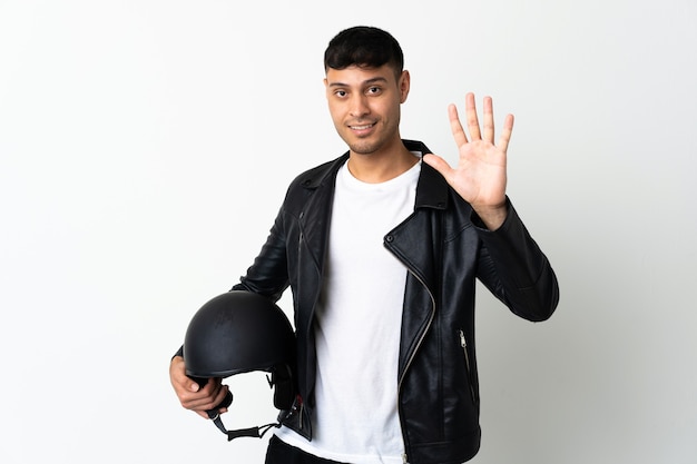 Man with a motorcycle helmet isolated on white counting five with fingers