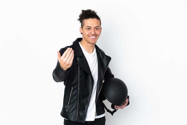 man with a motorcycle helmet over isolated white inviting to come