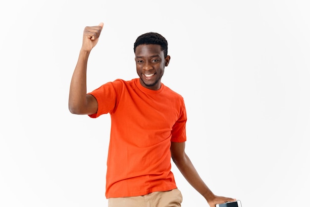 man with phone in hands respectful gesture with hand communication light background High quality photo